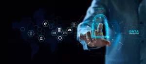 A person interacts with a digital lock icon on a virtual touchscreen, surrounded by various technology and data protection symbols, set against a dark background.